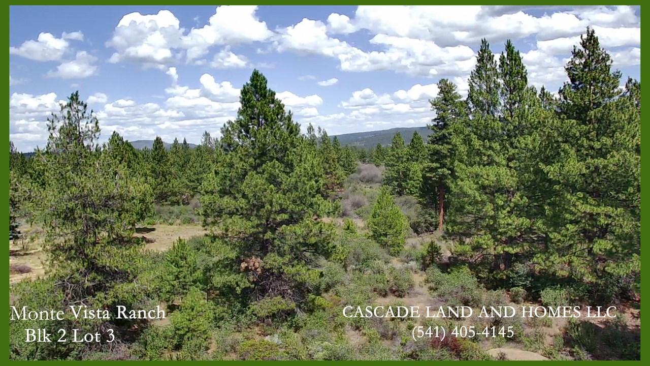 drone photo showing the top of the hill parcel! it sits at the top of the subdivision offering spectacular views, a quiet neighborhood, and in an area of custom homes.