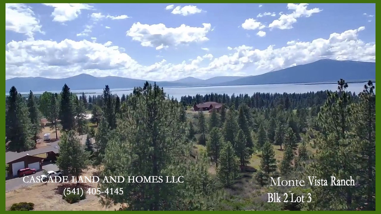 drone photo of agency lake and the majestic cascade mountains from the property. a two-story home here would make the views even more amazing! this parcel sits on the edge of the subdivision on top of the bluff, so a two-story home would not obscure the views that your neighbors enjoy.  mobile homes are not permitted in this subdivision and utilities must be run underground to preserve the integrity of the views. the property will need a well and septic installed, so be sure and check with the county on the permit process.