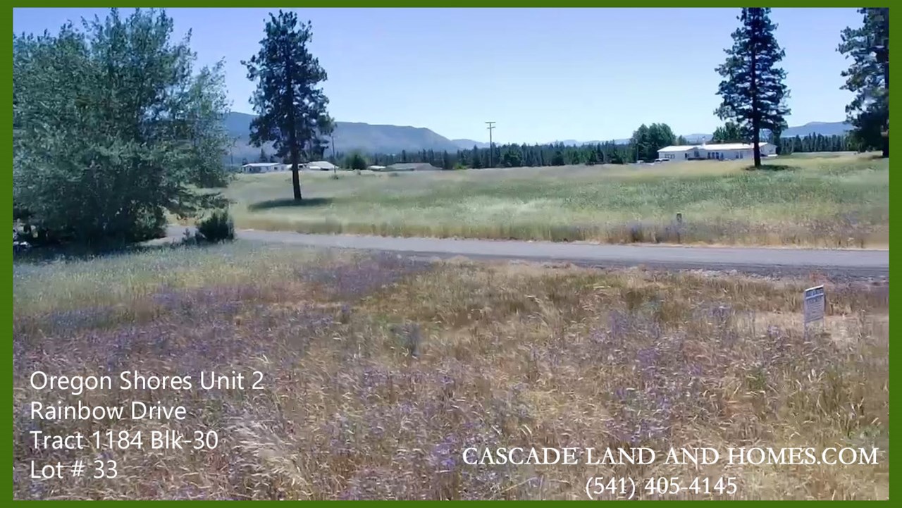 view of the property and wildflowers looking southeast at the nearby volcanic outcroppings.