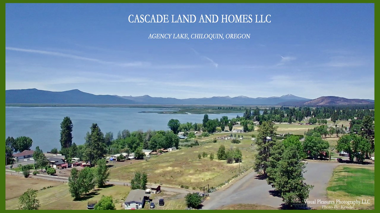 overhead drone view of the agency lake area and the surrounding cascade mountains!