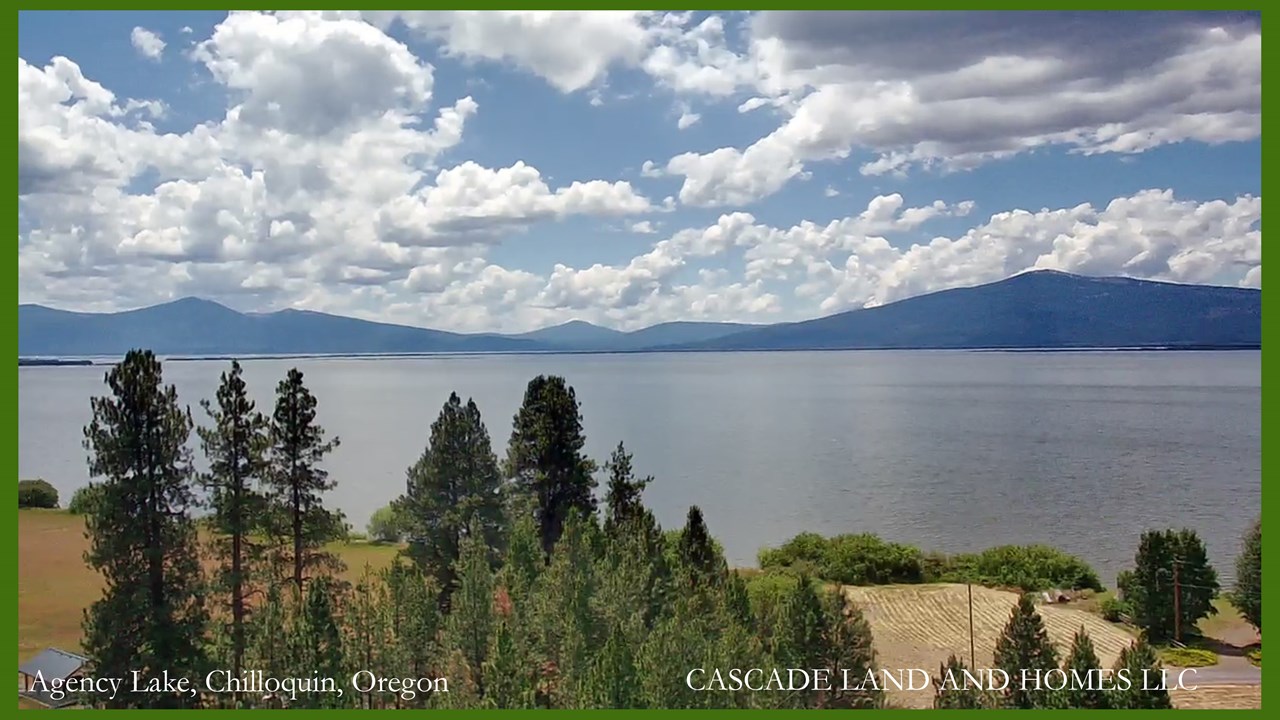 drone  view of agency lake shore line, surrounded by the cascade mountains!