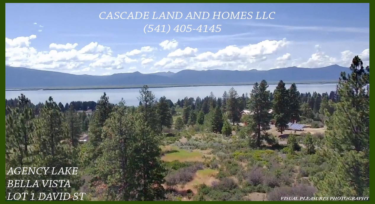 this is a drone photo taken from the property, and looking northwest. there are a few custom homes in the area. there is an 80 acre parcel that borders one side of this parcel, and the surrounding parcels are large offering privacy.