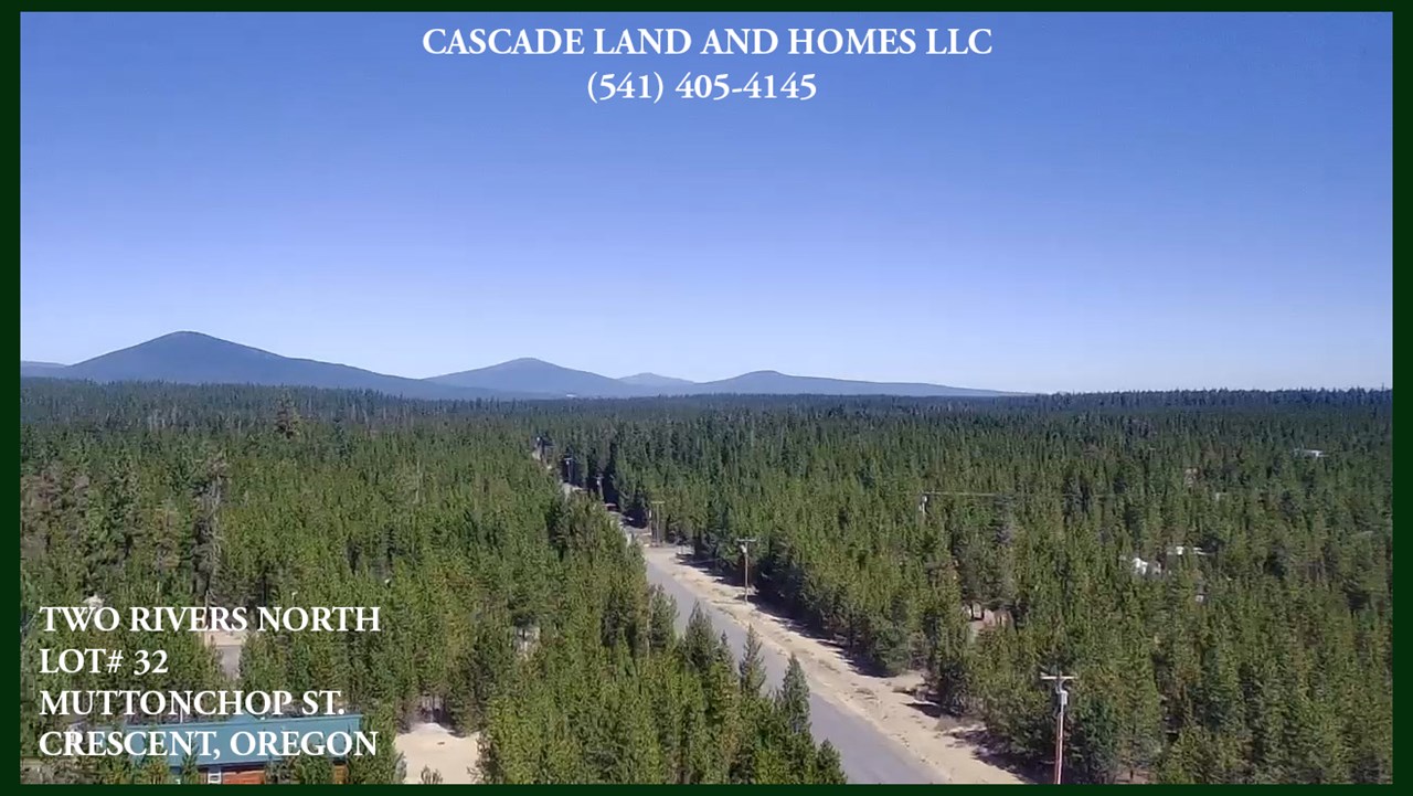 this is a drone video looking out from the property down muttonchop street. the homes are a nice distance apart from each other allowing for privacy, yet still within a community.