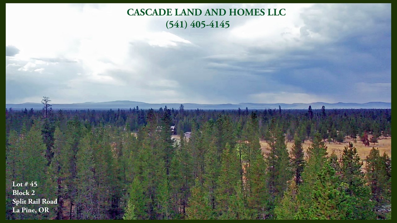 this a drone photo from above the property looking toward the cascade mountains.