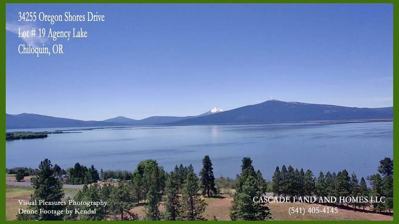 drone footage of agency lake taken from high above the property. the backdrop of the snow-capped mt. mclaughlin to the southwest adds to the spectacular scenery of this high-elevation lake that sits at around 4,000 feet elevation. to the east, the volcanic outcroppings and plateaus offer a stark, contrast to the lush, green pasturelands and foothills that surround the lake. it is high desert here, but it does get some snow in the winters.