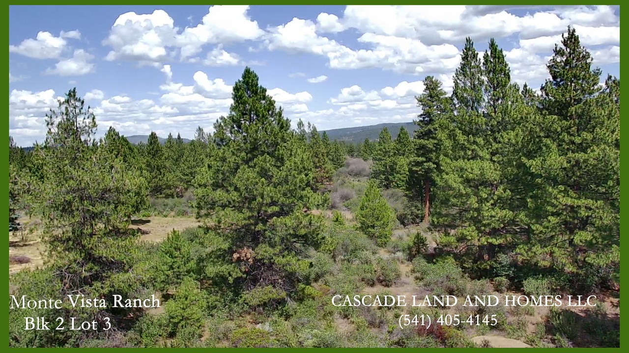 drone photo showing the top of the hill parcel! it sits at the top of the subdivision offering spectacular views, a quiet neighborhood, and in an area of custom homes.