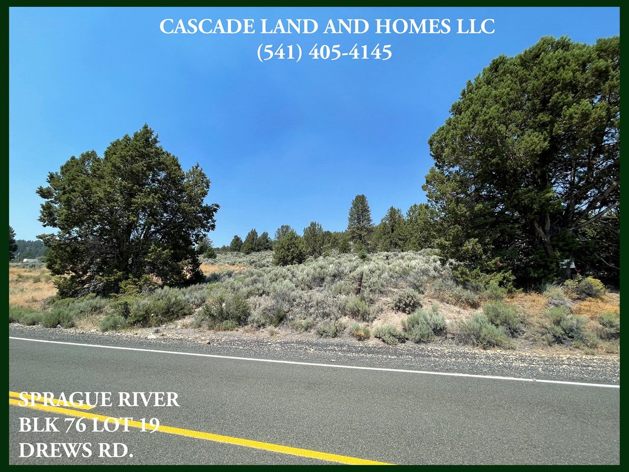 the road to the property is paved and very well maintained. it has easy access for quick trips to town or a commute. this photo was taken from across the street looking toward the property.