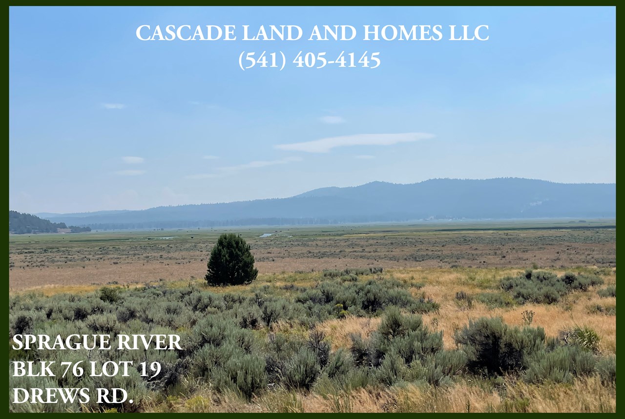 the property slopes upward just enough where your new home would have breathtaking views of the valley! this is taken from ground level, a two-story home would offer even better views of the valley and surrounding foothills. you can see the river, even from ground view here.