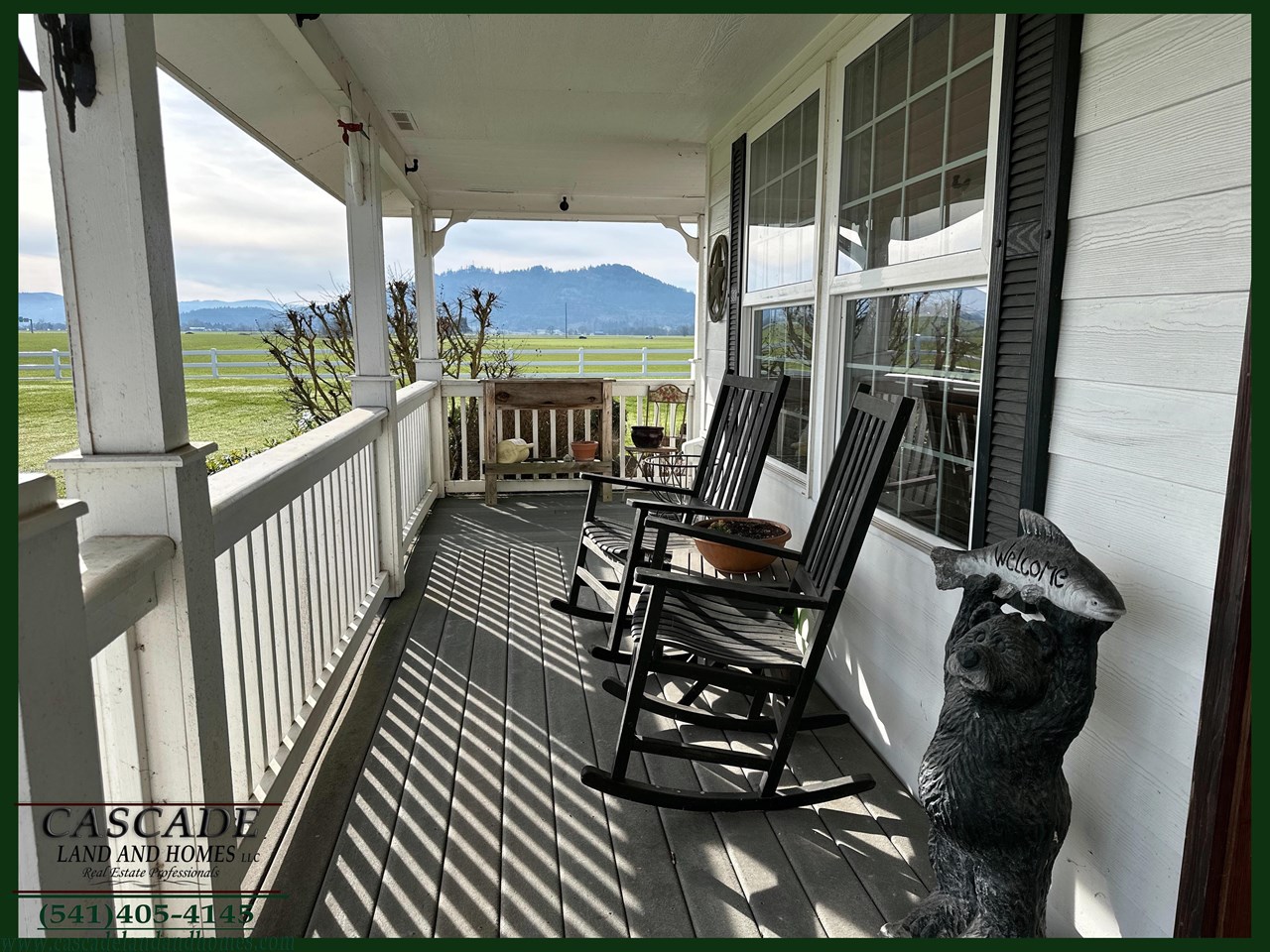 idyllic full length covered porch that looks out to the cascade mountains