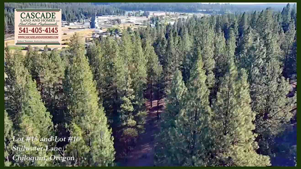 this is a drone photo from above the property. the town in the distance is chiloquin, and it's just a short drive from the property. the land slopes gently downhill from stillwater lane toward the williamson river.