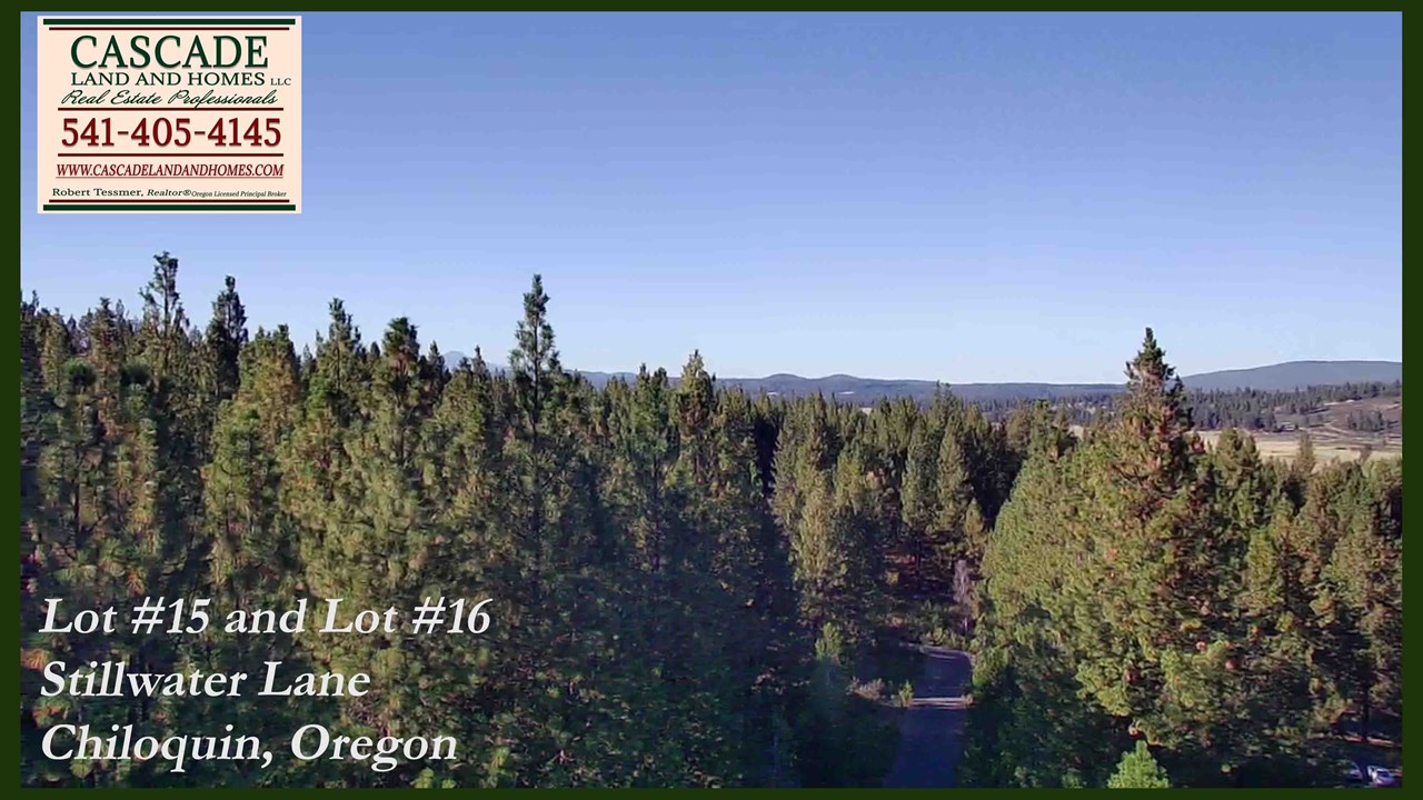 drone photo of the road leading to the property and the surrounding valley and foothills.