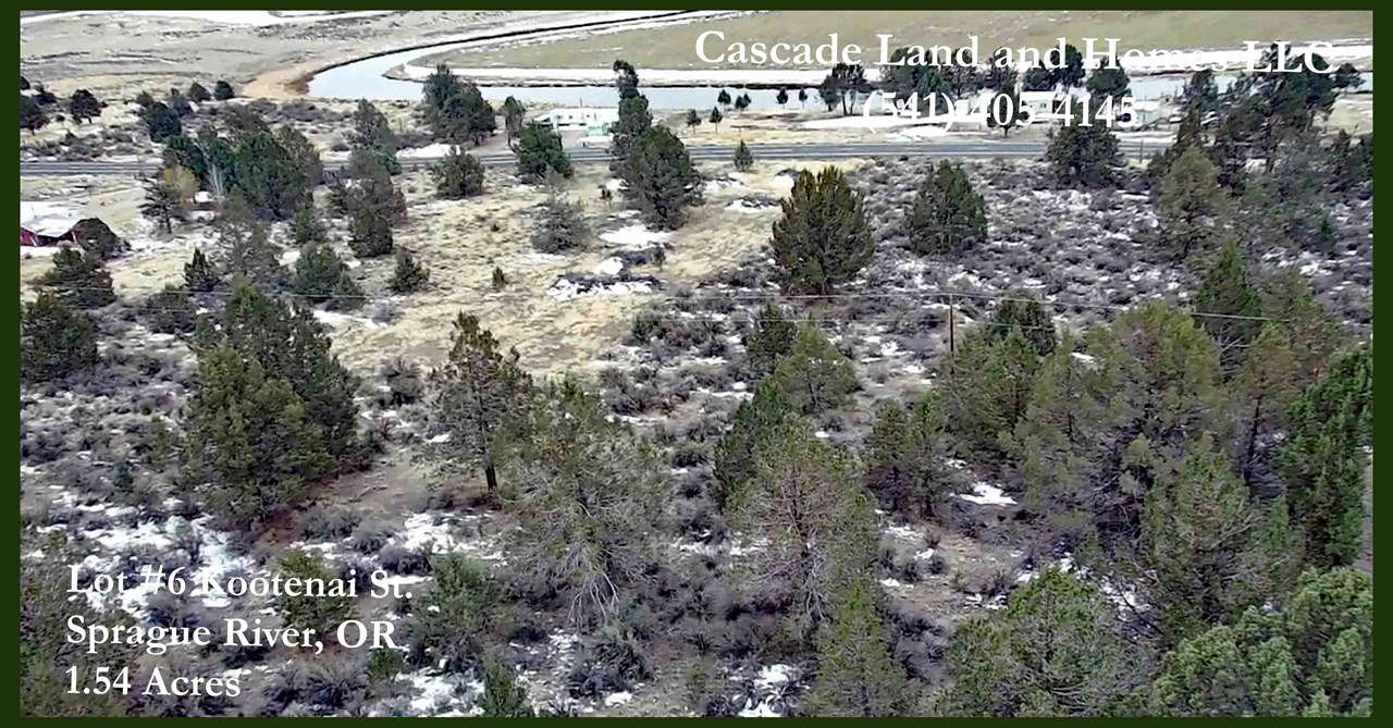 this is a drone photo taken from above the property looking out toward the sprague river.